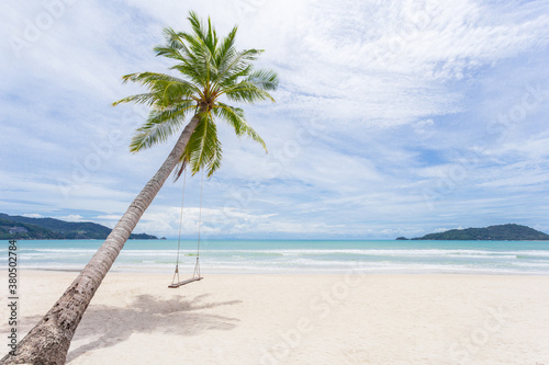 Fototapeta Naklejka Na Ścianę i Meble -  Exotic Tropical Paradise Swings over Crystal Clear Turquoise Blue Ocean Sea.