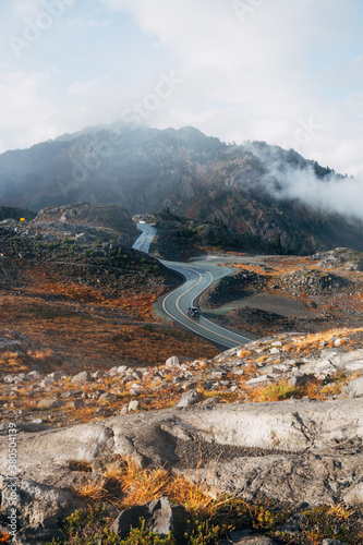 Mountain Road Winding Through Rocky Slopes photo