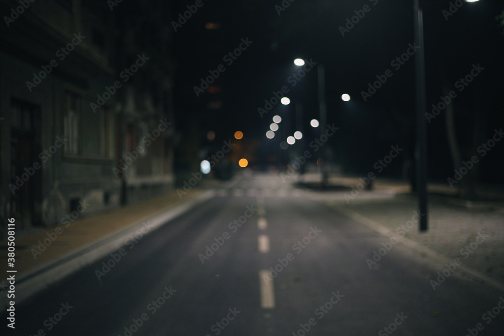 Empty street during the night. Blurry. Empty street during the night. Blurry.