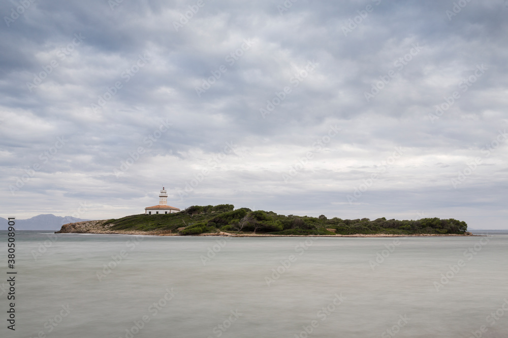 Small island with lighthouse Small island with lighthouse