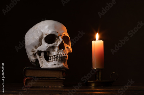 Wallpaper Mural Still life type a scene with human skull and candle Torontodigital.ca