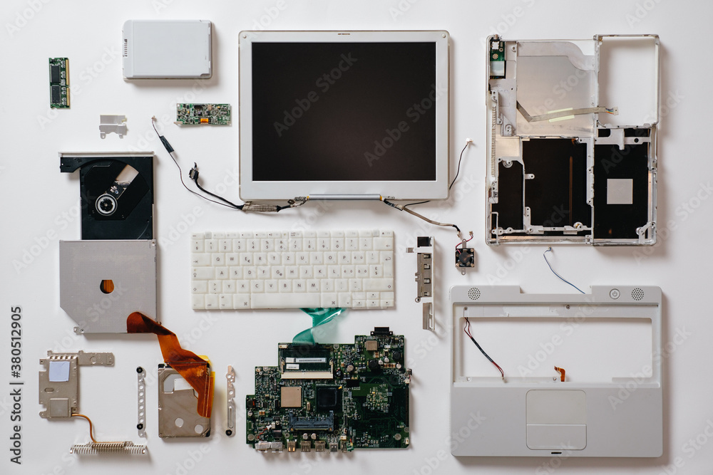 Disassembled White Laptop Parts On White Background Disassembled White Laptop Parts On White Background