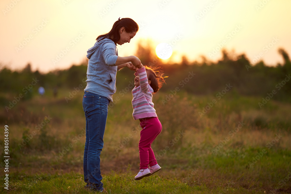 happy little girl with her mother outdoor in the autumn rural happy little girl with her mother outdoor in the autumn rural