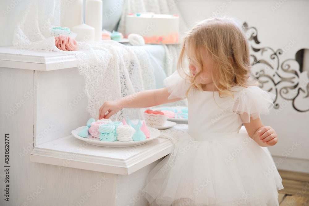 sweet tooth. little beautiful funny girl secretly eats marshmallows. candy bar for children party. healthy desserts. harmful products for teeth. sweet tooth. little beautiful funny girl secretly eats marshmallows. candy bar for children party. healthy desserts. harmful products for teeth.