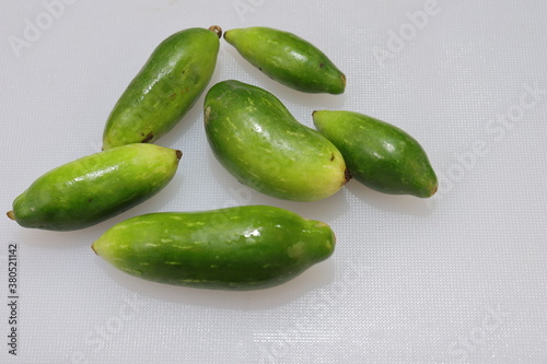 Wallpaper Mural Organic Raw green Coccinia grandis or Ivy gourd on a white background Torontodigital.ca