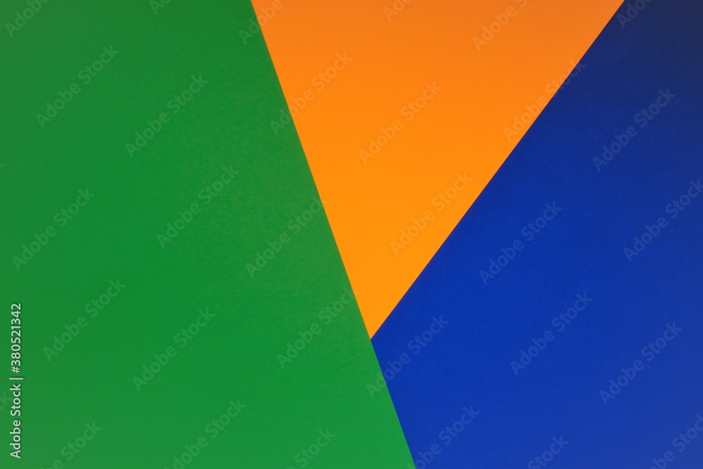 Color blocking background. Abstract geometric background.geometric pattern in orange, green and blue colors.Paper Striped geometric background. paper abstract texture.