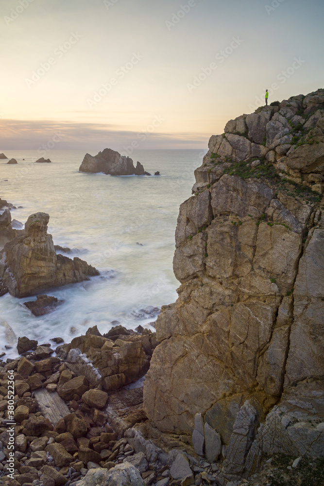 Man on the edge of a great cliff Man on the edge of a great cliff