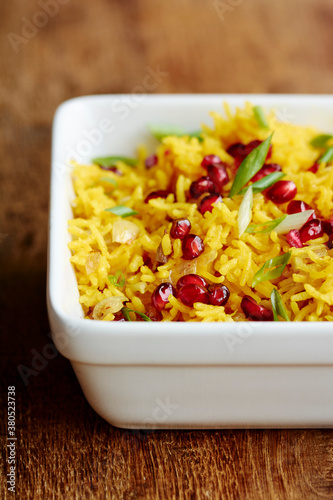 Spicy Yellow Rice with Pomegranae Arils photo