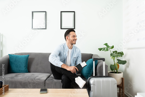 Hispanic man with a suitcase