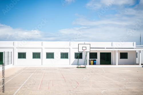 An empty sports ground at high noon