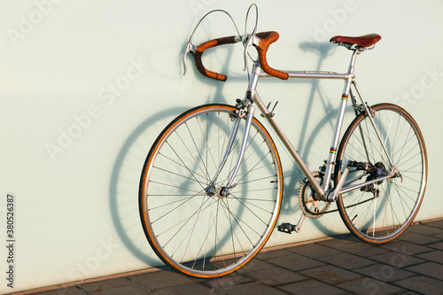 Vintage bicycle against a wall. photo