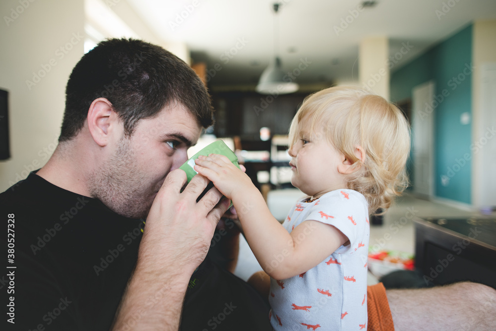 Helping Daddy drink Helping Daddy drink