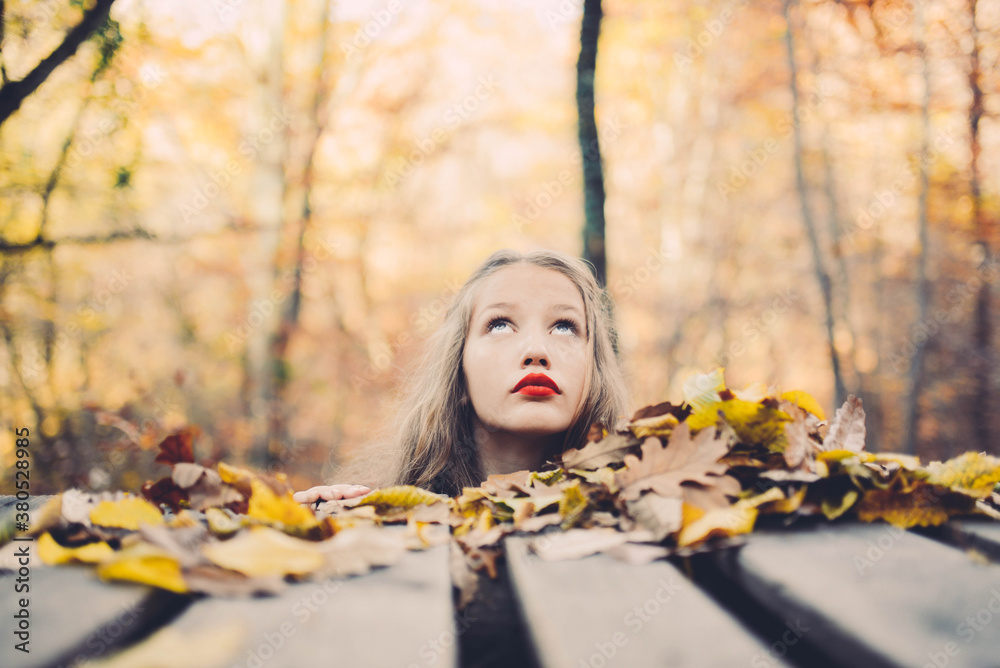 Young girl enjoying nature in autumn Young girl enjoying nature in autumn