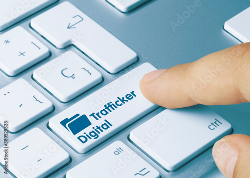 Trafficker Digital - Inscription on Blue Keyboard Key.