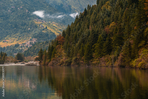 Fototapeta Naklejka Na Ścianę i Meble -  The mountain and lake landscape in autumn time, in Dagu glacier National Park, in Sichuan, China.
