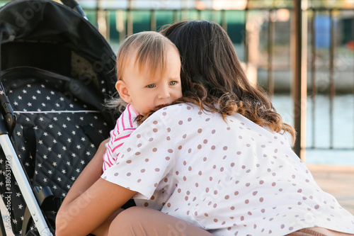 Woman and her cute baby in ...