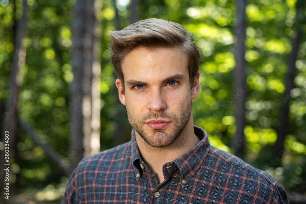 Portrait of a handsome masculine man. Serious face. Sexy gorgeous stylish man.