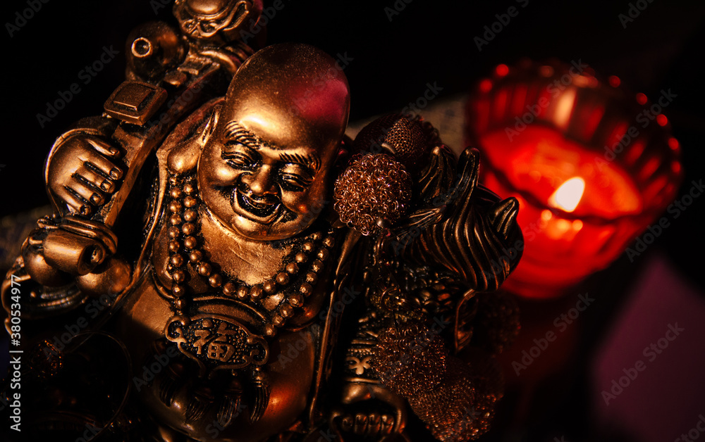 Obraz premium Top view of a table with Buddha figurine and candles.