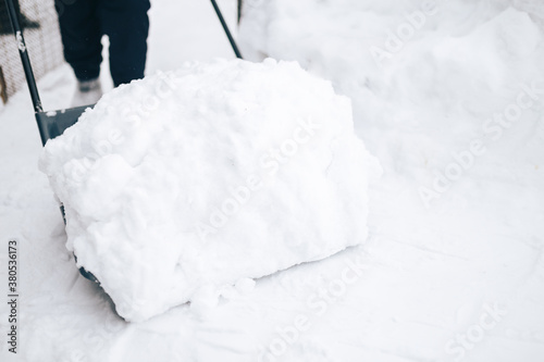 Snow removal with shovel © Anastassiya 