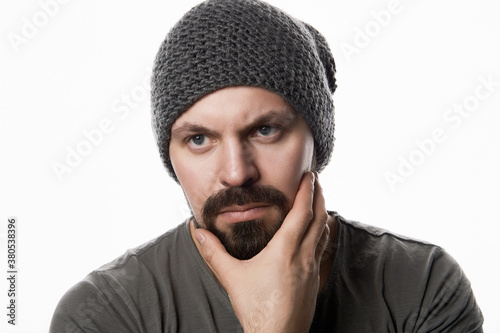 Isolated portrait of handsome Bearded Man in Hat