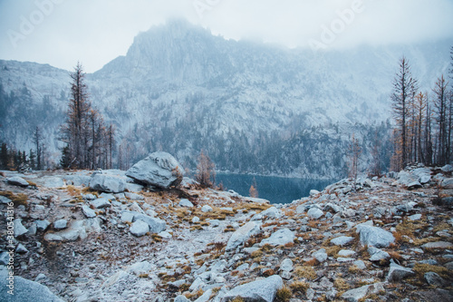 Wild Autumn landscape in first snow of the year photo