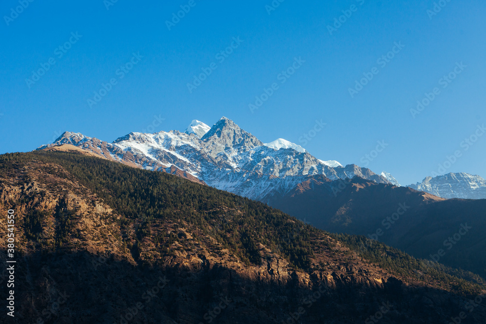 Mt. Nilgiri towering above in the himalayas. Mt. Nilgiri towering above in the himalayas.
