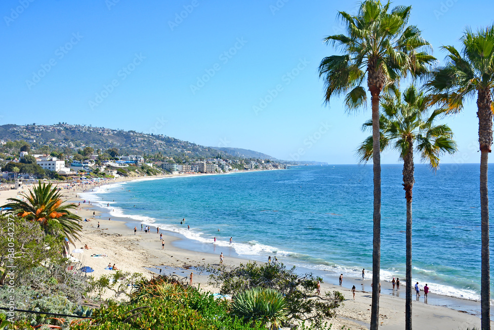 view of Southern California beach and coastline with palm trees