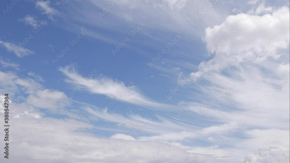 Blue sky white clouds. Puffy fluffy white clouds. Cumulus cloud scape timelapse. Summer blue sky time lapse. Dramatic majestic amazing blue sky. Soft white clouds form. Clouds time lapse background Blue sky white clouds. Puffy fluffy white clouds. Cumulus cloud scape timelapse. Summer blue sky time lapse. Dramatic majestic amazing blue sky. Soft white clouds form. Clouds time lapse background