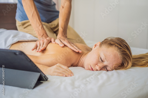 Massage by training online video. Online massage training. Health Wellness Massage Online Training Concept