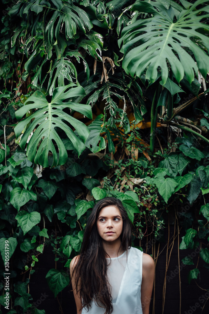 Woman in front of foliage Woman in front of foliage