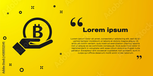 Black Hand holding Bitcoin icon isolated on yellow background. Blockchain technology, digital money market, cryptocoin wallet. Vector.