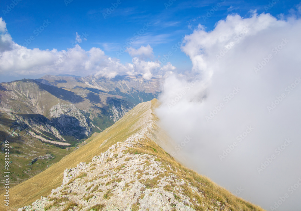 Monte Vettore (Italy) - The landscape summit of Mount Vettore, one of the highest peaks of the Apennines with its 2,476 meters. In the Monti Sibillini national park, Marche region.