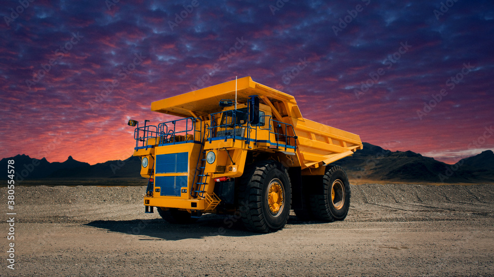 A large quarry dump truck in a coal mine. Loading coal into body work truck. Mining equipment for the transportation of minerals. A large quarry dump truck in a coal mine. Loading coal into body work truck. Mining equipment for the transportation of minerals.