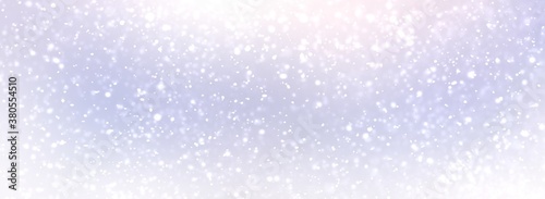 Snow fall on pastel blue lilac background. Blurred texture. Winter nature empty banner for holidays design. Outside light delicate illustration.
