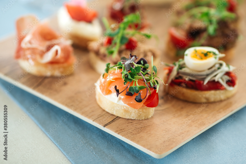 Assorted spanish tapas with different toppings Assorted spanish tapas with different toppings