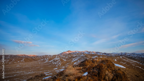 Sunset sky during winter over Altai mountain range in Govi-Altai province, Mongolia.
