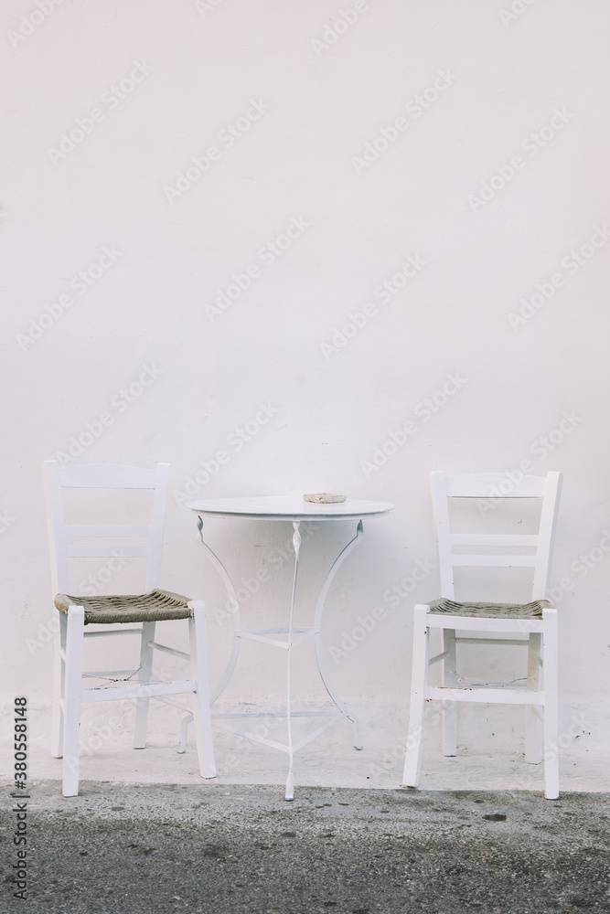 Chairs and table on the street Chairs and table on the street