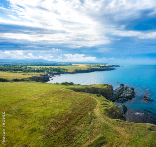 Aerial panoramic view of picturesque coastline with sand beaches  rocks and green forests on the southern Black Sea coast  Bulgaria.