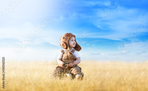 Wallpaper Mural Young aviator with airplane model Torontodigital.ca