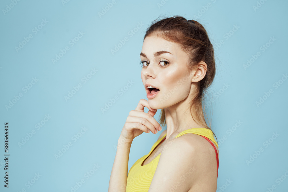 Sportive woman skipping rope exercise gym fitness blue background