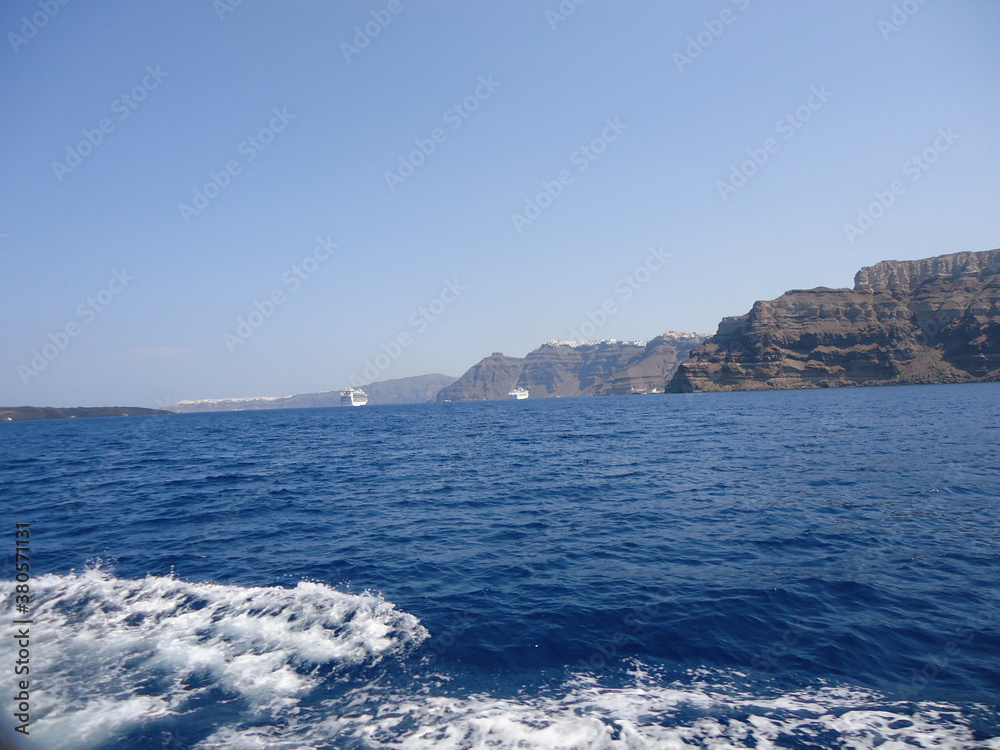 Santorini is one of the Cyclades islands in the Aegean Sea. It was devastated by a volcanic eruption in the 16th century BC, forever shaping its rugged landscape Santorini is one of the Cyclades islands in the Aegean Sea. It was devastated by a volcanic eruption in the 16th century BC, forever shaping its rugged landscape