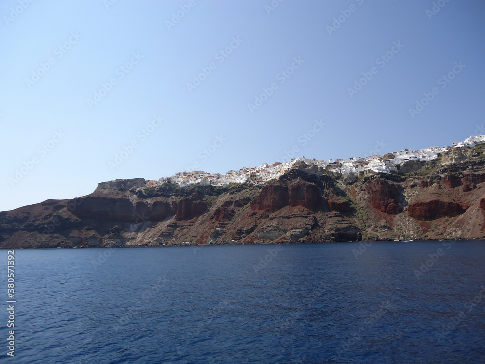 Santorini is one of the Cyclades islands in the Aegean Sea. It was devastated by a volcanic eruption in the 16th century BC, forever shaping its rugged landscape