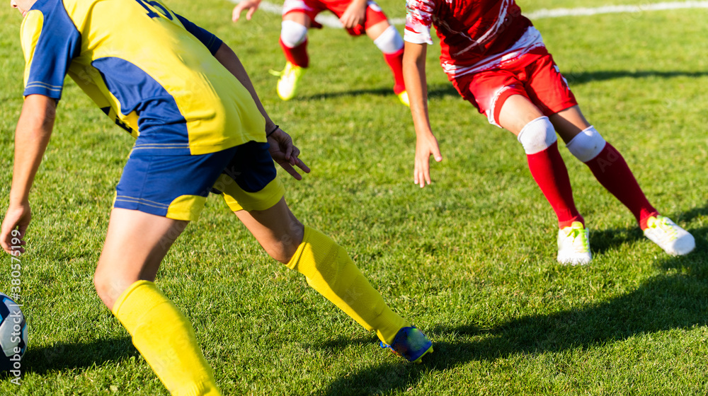 Boys play soccer sports field Boys play soccer sports field