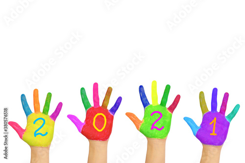 The number 2021 written on the brightly painted hands.