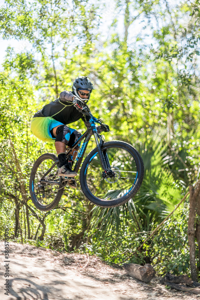 Mountain Biker Catches Air on Trail Jumps Mountain Biker Catches Air on Trail Jumps