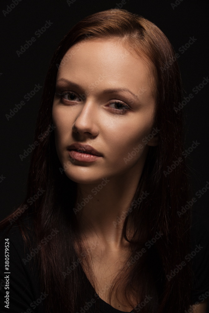 Beauty woman face portrait. Beautiful spa model girl with perfect fresh clean skin. Glitter nude makeup Youth and skin care concept. Isolated on gray background Beauty woman face portrait. Beautiful spa model girl with perfect fresh clean skin. Glitter nude makeup Youth and skin care concept. Isolated on gray background