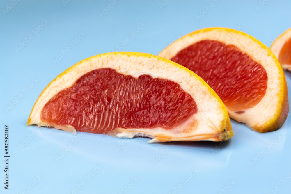 Grapefruit on a blue table Grapefruit on a blue table