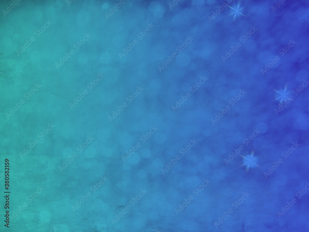 An image of snow flakes falling superimposed upon a background of winter blue and green, with stars on the right hand side of the image An image of snow flakes falling superimposed upon a background of winter blue and green, with stars on the right hand side of the image