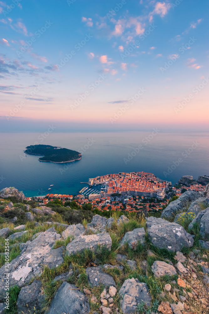 Dubrovnik, Croatia - Elevated View of the Old Town and the Island of Lokrum in Sunset Light Dubrovnik, Croatia - Elevated View of the Old Town and the Island of Lokrum in Sunset Light