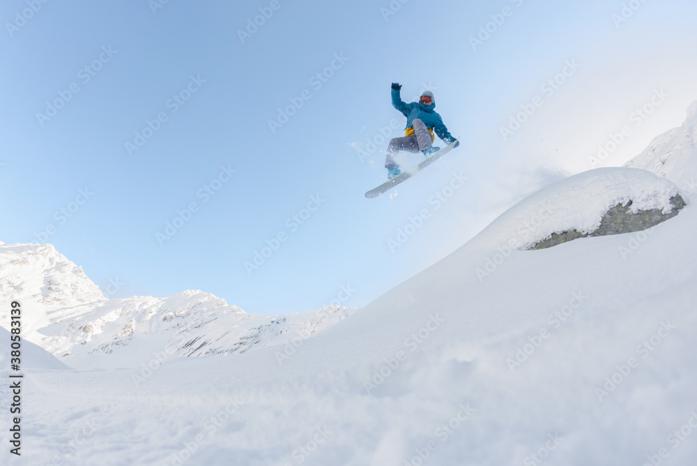 Cool snowboarder in midair Cool snowboarder in midair